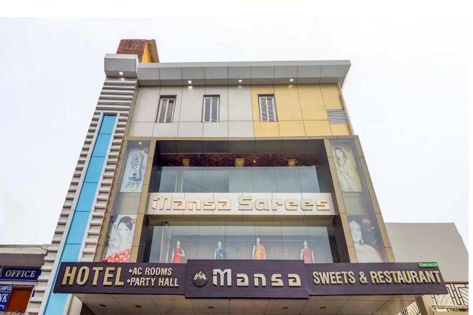 Hotel Mansa Kanpur Bagian luar foto